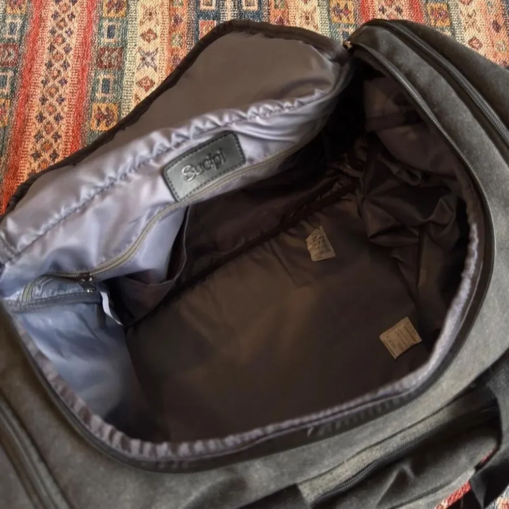 Sucipi Black canvas duffle bag with leather accents